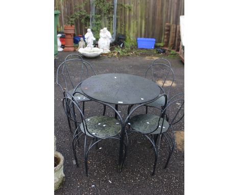 &nbsp;A metal outdoor garden dining set, including table and four chairs.&nbsp;