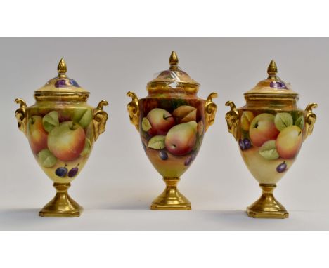 Coalport: A garniture of three vases and covers. Harvest gold, painted by J Mottram and K Hancock
