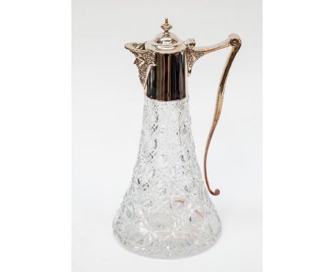 An Elizabeth II hob nail cut glass claret jug with silver collar, handle and cover, the spout with Bacchanalian mask terminal