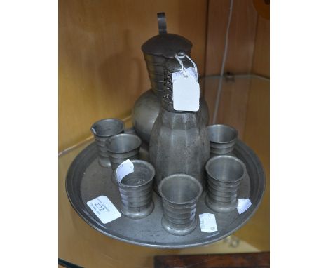 Norwegian pewter decanter set and six tots, plus tray, an Art Deco Norwegian pewter, sugar castor (9)