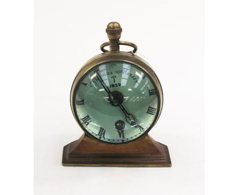 &nbsp;A mantle clock with white enamel dial with Roman numerals marked WD Broad Arrow and "Thomas Mercer 1939". Encased in a 