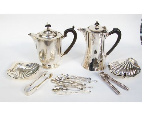 Group of silver plated items including coffee pot, hot water pot, oyster shell shaped dishes and a nut cracker