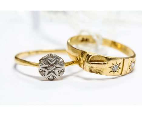 A gold buckle ring, set with two diamonds, stamped 18ct, size Q, approx 2.7gms; together with an 18ct gold and diamond chip r