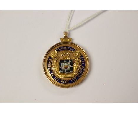 A 15ct gold and enamel 1922 Rochdale CC Winner of Wood Cup Season Medal, hallmarked V&amp;S, Birmingham, H. Stirzaker, total 