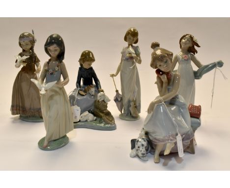 A group of six Lladro and Nao young girl studies, three with doves no's 6157, 7611, 6153, 5466 etc. 6 items