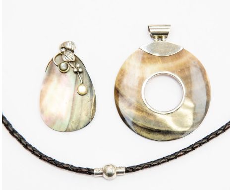 Silver and cut shell jewellery; two pendants, together with a leather neck item with silver clasp (3)