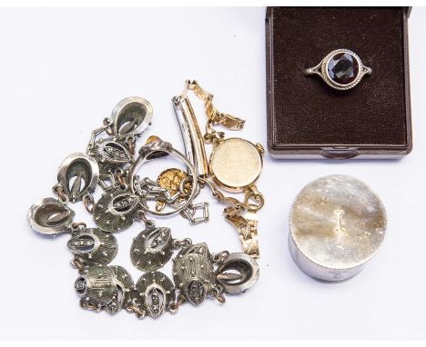 A yellow metal Avia ladies watch, marcasite white metal ring, a silver and garnet ring and a white metal screw box