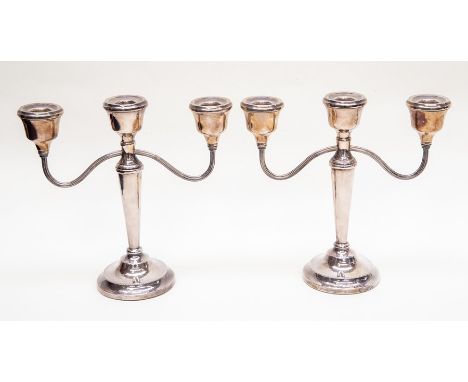 A pair of Birmingham silver candelabras, filled, 1978, maker A.T Cannon Ltd