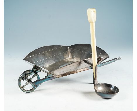 Gardening Interest: An Art Deco white metal novelty chutney / sauce bowl in the shape of a wheelbarrow and shovel spoon, the 