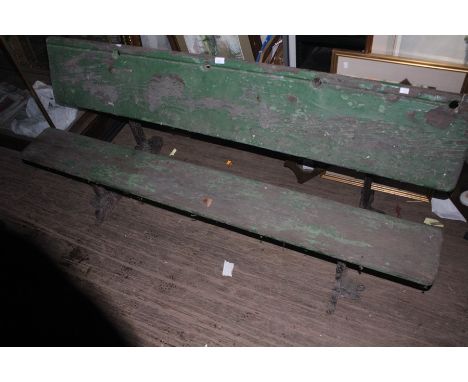 An early 20th century oak and iron framed garden table bench