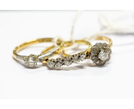 An 18ct gold and diamond five-stone ring, size P, approx 2.1gms; an 18ct gold and platinum solitaire diamond ring, approx 0.2