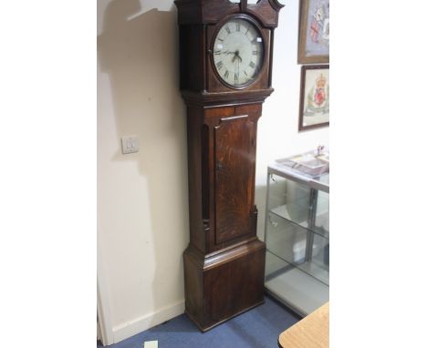 A George III mahogany and oak longcase clock, circa 1800, swan neck cornice, circular aperture, roman numerals.