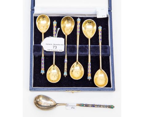 A cased set of enamel silver gilt teaspoons, marks only partially distinct showing 84 Zoloniks mark