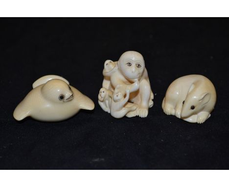 Three ivory Netsuke, comprising a rat, bird and monkey