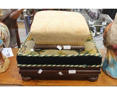 A rectangular foot stool, circa 19th Century, mahogany, raised on bun feet, tapestry upholstered pad with initials together w