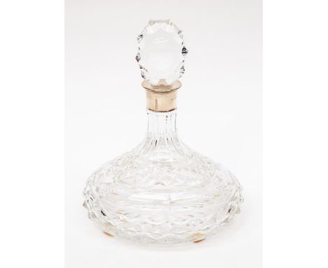 A cut glass Brierley crystal Ships Decanter with London silver collar hallmarked in 1973