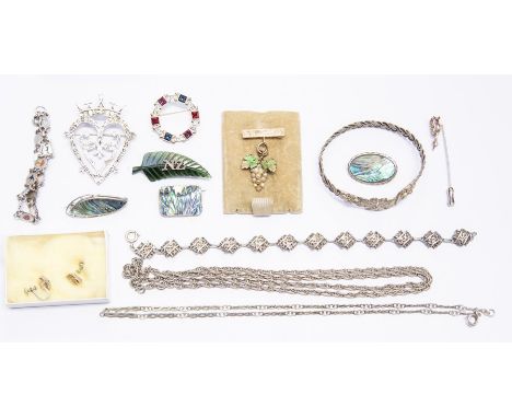 A coronet / coat of arms silver brooch, silver chains, silver and white metal bracelets, silver NZ on hardstone and three bro