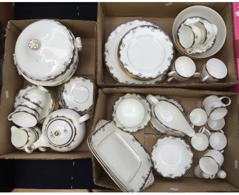 A large quantity of Wedgwood Chartley pattern dinner and tea wares including tureens, dinner and side plates, bowls, cake pla