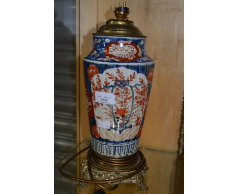 An early 19th Century imari vase, possible Chinese, ormolu mounted, converted to a lamp