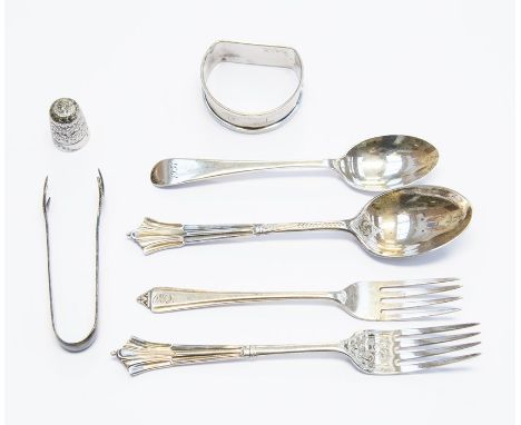 A collection of silver flatware, including spoons, thimble, 3.86 ozt approx