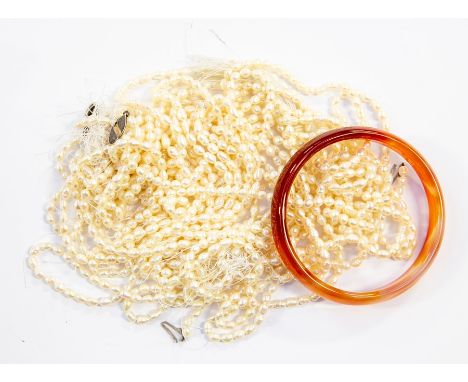 A collection of loose&nbsp; fresh water pearls strands total gross 185gms along with an agate bangle ( 1 bag)