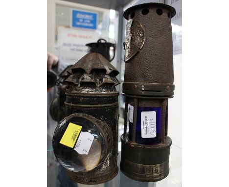 Hailwoods miners lamp with blue glass along with a hand held lamp
