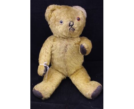 A vintage teddy bear, circa 1950, jointed and growler