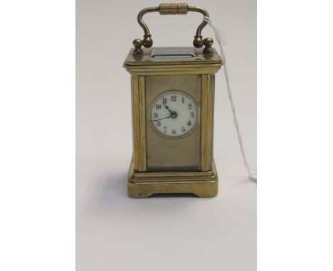 A miniature French brass cased carriage clock, Edwardian 1901-10