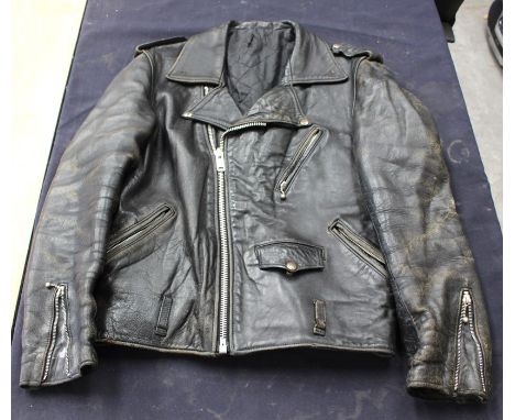 John Lennon (The Beatles); leather jacket owned and worn by John Lennon. Authenticity from vendor as below;Includes letters a