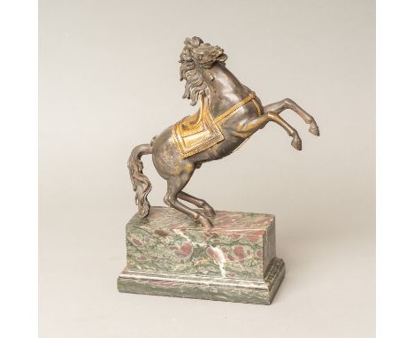 Jumping Horse, bronze sculpture silvered with gilded sadle and bridle. On marble base early 19th Century. 30 x 20 cm.