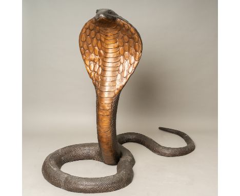 Cobra Sculpture, monumental bronze sculpture. Over live size. In artificial design. Bronze cast with brown patina. Lightly we