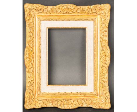 Gallery Frame , in Roccoco design with  extended decorations in a textile bar   . Picture size 16,5 x 23,3  cm Total size 38 