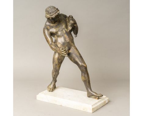Servant after the Ancient, sculpture bronze cast with original patina on later white marble base. 56 cm high.