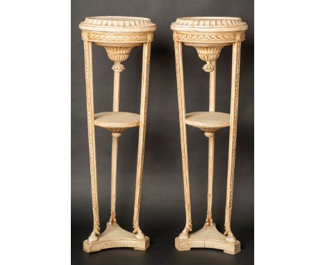 Pair of French or English Tripod Stands, each on triangle base with three long conic legs ending in gold feet. Middle section