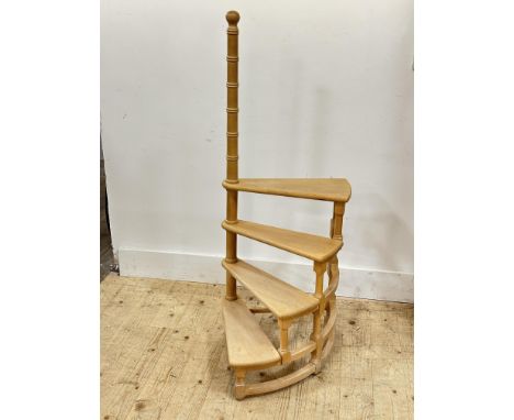A modern pine set of library steps composed of four steps, on centre turned column (h.123cm step height: 64cm width: 46cm)