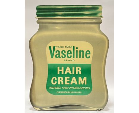 Vintage advertising,&nbsp;a large and unusual easel back cardboard barber shop advertising sign in the form of a Vaseline hai