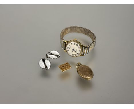 A pair of Norwegian silver earrings,&nbsp;of scrolling white enamel leaf design L x 1cm, a oval gilt metal locket with chased