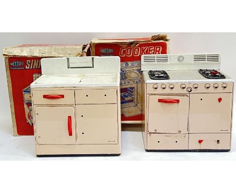 A vintage boxed Mettoy tin plate 'Mignonette' cooker with accessories, together with a similar Mettoy boxed 'Mignonette' sink