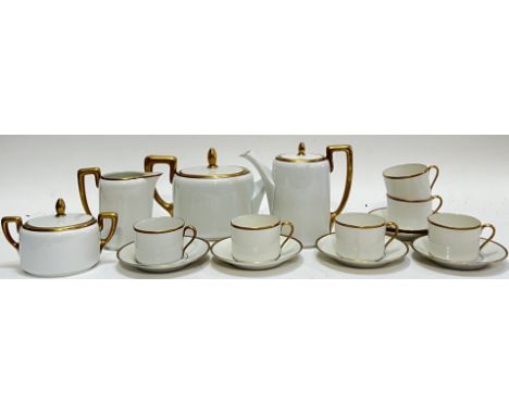 A plain gilt Rosenthal china tea/coffee set comprising six cups, six saucers, a sugar bowl/sucrier, a milk jug, a coffee pot 