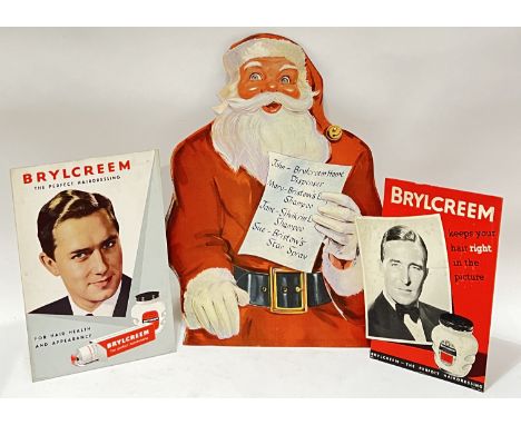 Vintage advertising,&nbsp;a large Brycreem cardboard barber shop Christmas sign modelled as Santa Claus (h- 56cm, w- 42cm), a