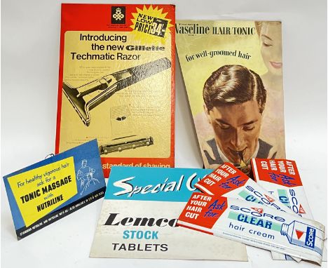 A mixed group of vintage Barber Shop advertising signs,&nbsp;comprising a Gillette razor easel backed carboard advertising si