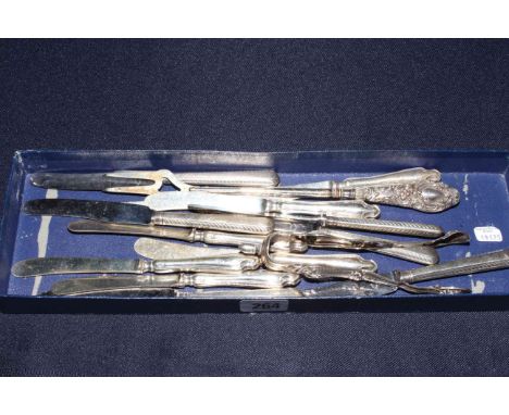 Silver handled knives, toasting fork, etc