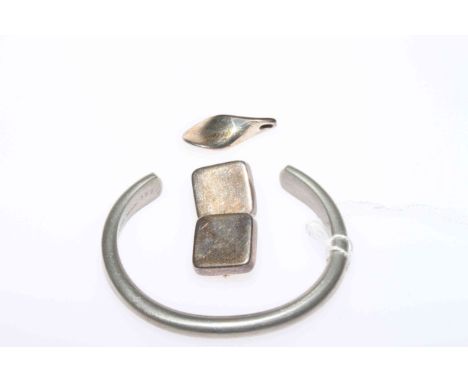 Georg Jensen ring, bangle, pair of clip earrings and pendant, each signed