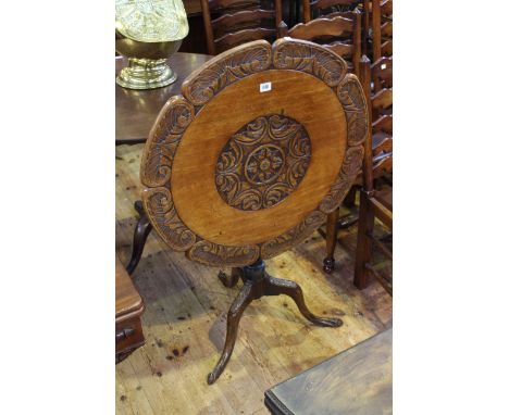 19th Century carved mahogany circular snap top occasional table on pedestal tripod base, 73cm diameter