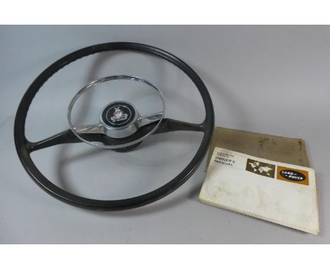 A Vintage Rover Steering Wheel and a Land Rover Series III Owners Manual 