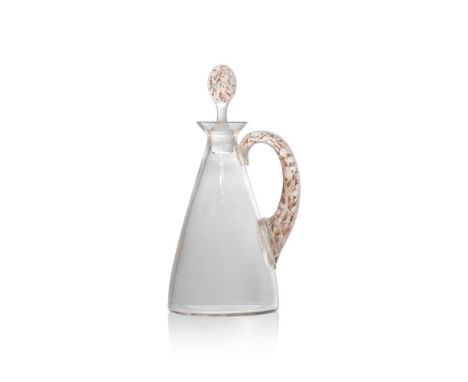René Lalique (French 1860-1945) PRUNELLES CARAFE WITH HANDLE, D designed 1923clear, frosted and sepia stainedengraved R. Lali