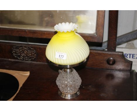A hobnail cut glass and plated oil lamp with opaque yellow glass shade