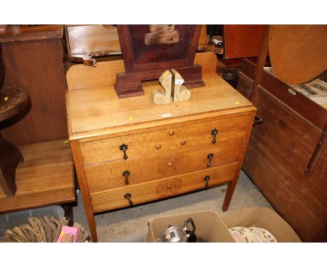 A light oak three drawer chest 