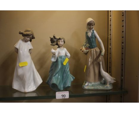 Three various Nao figurines 