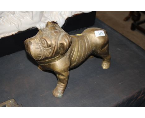 A brass model in the form of a bulldog 